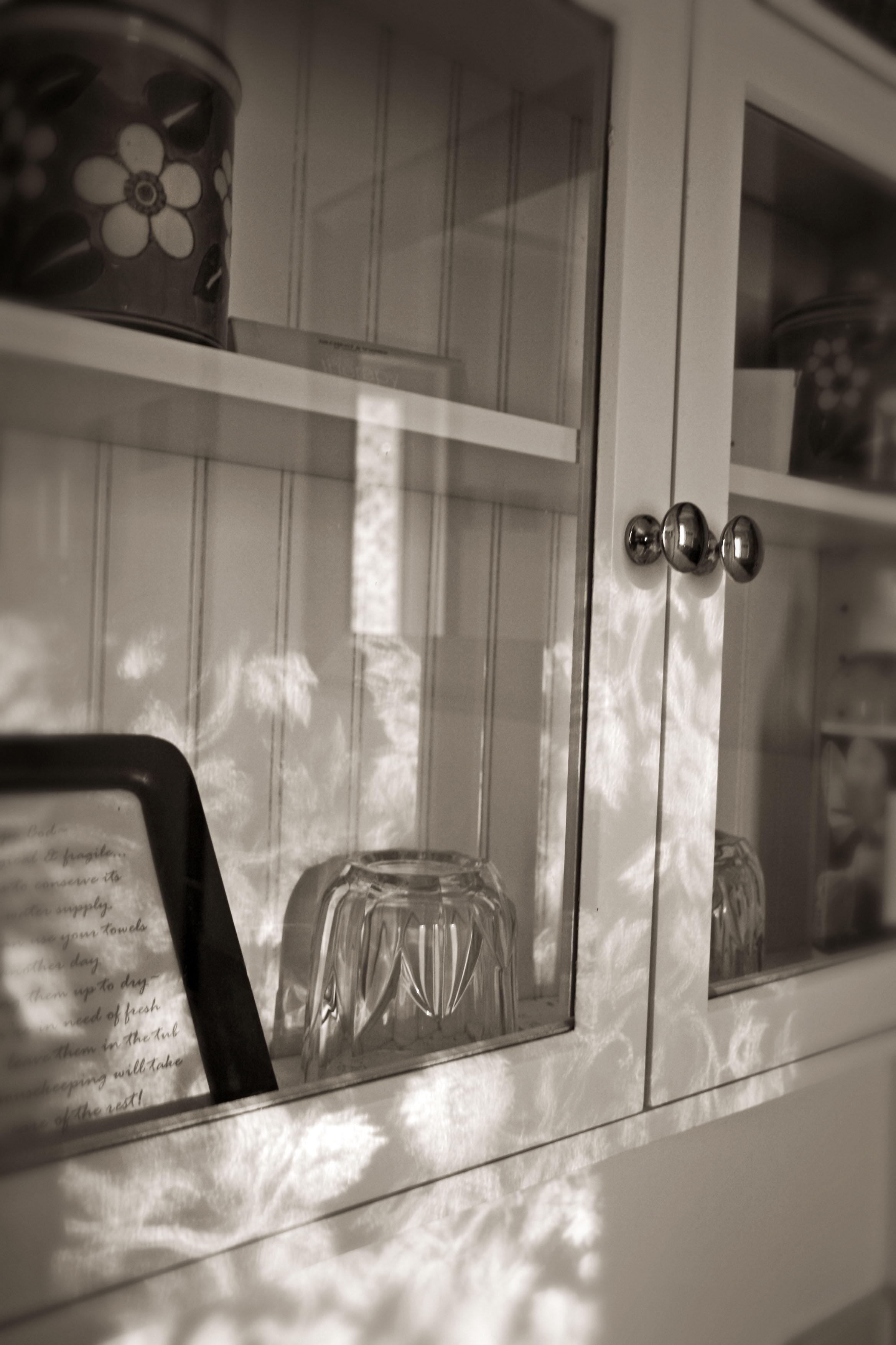 A closeup of Lair 4's bathroom medicine cabinet in black and white