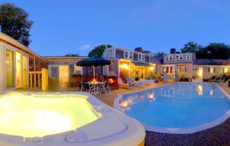 The hot tub and pool at dusk