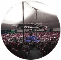 A crowd gathers at the music tent