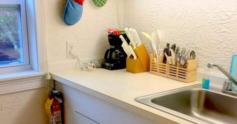 Kitchen of Sweet 9 showing sink and utensils