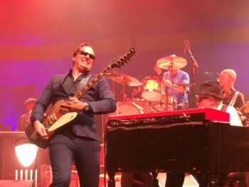 Joe Bonamassa playing guiter at the Melody Tent